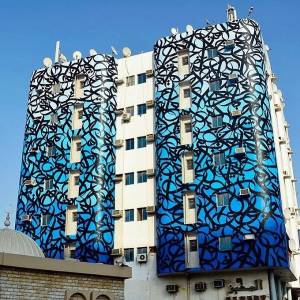 street-art-avenue-mosaic-blue-el-seed-ajman-uae