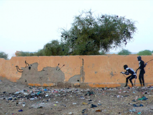 banksy - street art - graffiti - mali - boys hunting