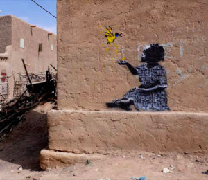 banksy - street art - graffiti - mali - girl bird